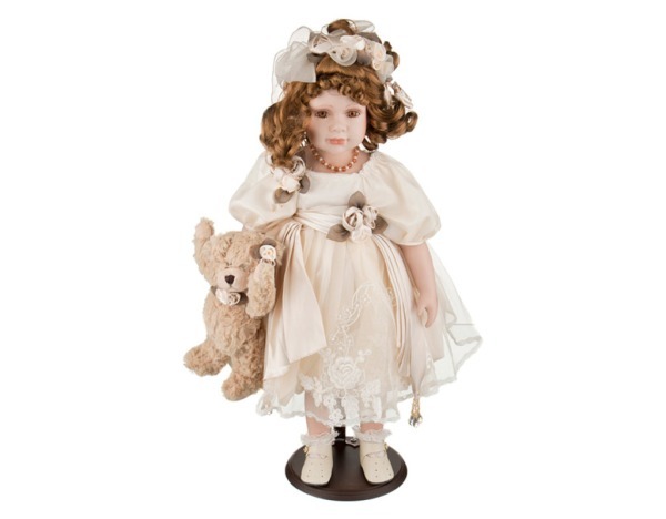 Кукла фарфоровая в кремовом платье высота=55 см. Reinart Faelens (D-346-012) 